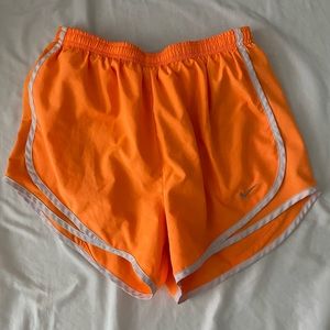 Bright orange nike shorts
